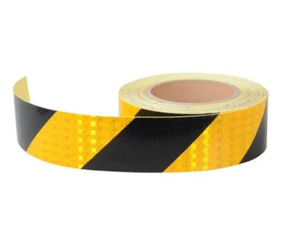 Imagem de Rolo Fita Adesiva Refletiva Zebrada Amarela Preta