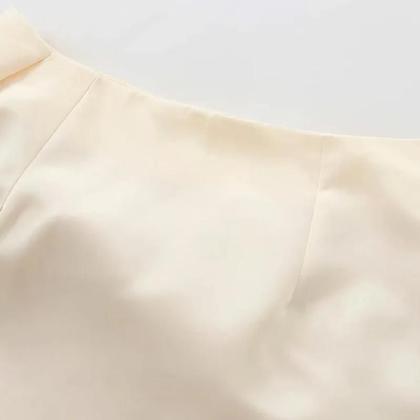 Imagem de Saia Midi em Cetim para Mulheres - Modelo Plissado com Arco - Verão 2024