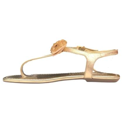 Imagem de Sandália rasteira laço dourada loucos e santos l10133013