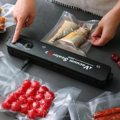 https://a-static.mlcdn.com.br/420x420/seladora-a-vacuo-maquina-de-tirar-ar-de-embalagens-saco-plas-online/bomkomprarcomerciodeutilidades/gh-3810741/ed2a2d20dc857f9fe20d8d52a11c8e77.jpeg