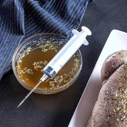 Imagem de Seringa para injetar temperos frangos carne natal