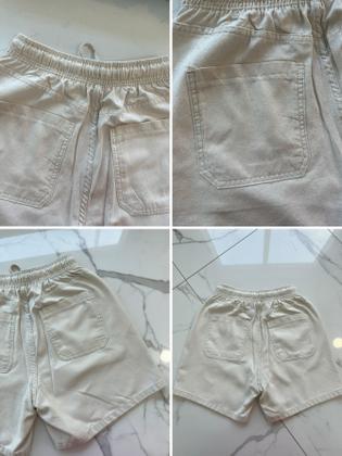 Imagem de Short Feminino Sarja Bege Claro Detalhe Plaquinha Prata Tachas Rebites Chapinha Prateados Cintura Alta Elástico e Cordão