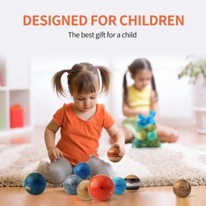 Imagem de Stress Balls define planetas do sistema solar com crianças astronautas