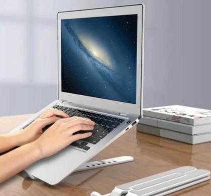 Imagem de Suporte Para Notebook Com 6 Níveis de Ajuste e Sistema Dobrável Ultra Portátil Cor Rosa Branco e Preto