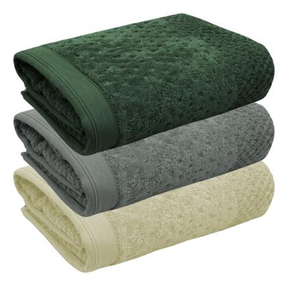 Imagem de Toalha Pollo  A Maciez do Algodão e o Charme da Barra Aveludada