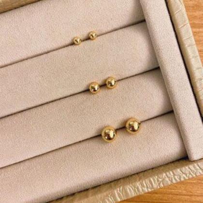 Imagem de Trio de brincos Bolinha antialérgico Banhada Dourado 3 pares