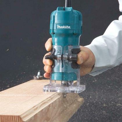 Imagem de Tupia Manual de Laminação Makita 530W, Pinça 6mm ¼, 30.000rpm com kit 12 Fresas  3709