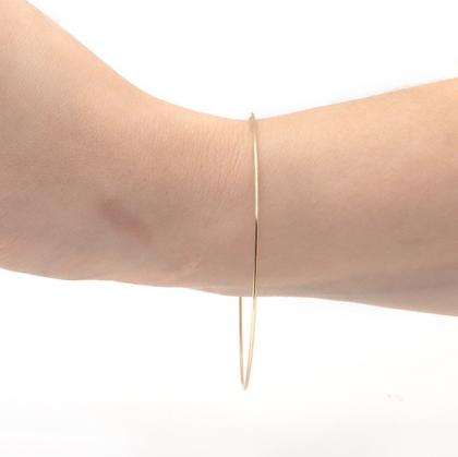 Imagem de Uma Argola Pulseira Ouro 10k
