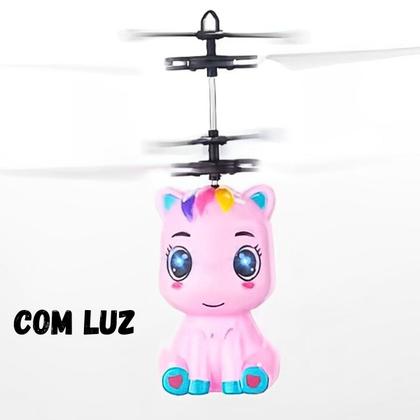 Imagem de Unicornio Rosa Brinquedo Voador Sensor De Mão Luz Robô Voa Castela