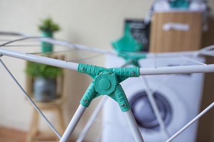 Imagem de Varal de chão grande e resistente em aço atenas branco com 135cm dobravel com regulagem de altura nas abas