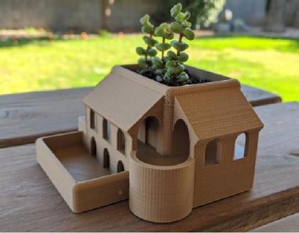 Imagem de vaso suculenta modelo casa romana