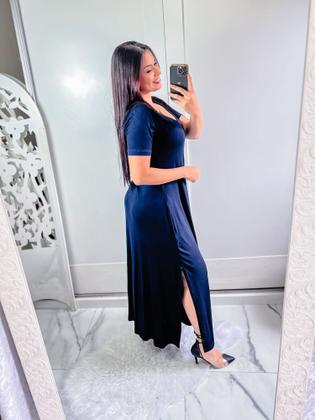 Imagem de vestido gola V com bolço e fenda lateral