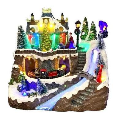 Imagem de Vila natalina com trem e iluminacao