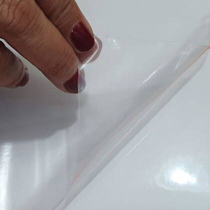 Imagem de Vinil Adesivo Transparente Para Laminação a Frio Papel Plástico Envelopar Proteção Cristal Brilhante