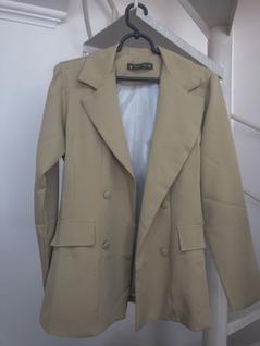 Blazer de alfaiataria com um botão forrado