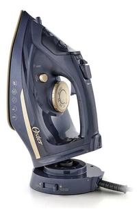 Ferro De Passar Oster A Vapor Sem E Com Fio Base Cerâmica Azul 220v