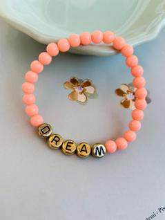Pulseiras de miçangas tons pastéis Salmão com escrita Dream Sonho