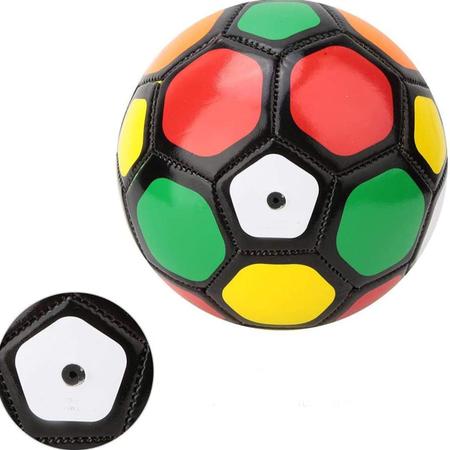 Jogador de futebol colorido com bola