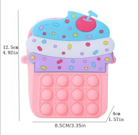 Imagem de Bolsinha pop it silicone formato cupcake com alcinha fofa moderna