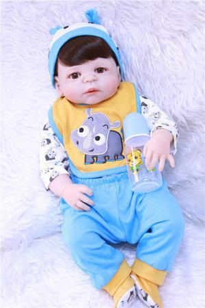 boneca bebe reborn menino corpo de silicone roupa azul com babador