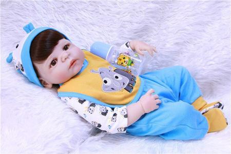 boneca bebe reborn menino corpo de silicone roupa azul com babador