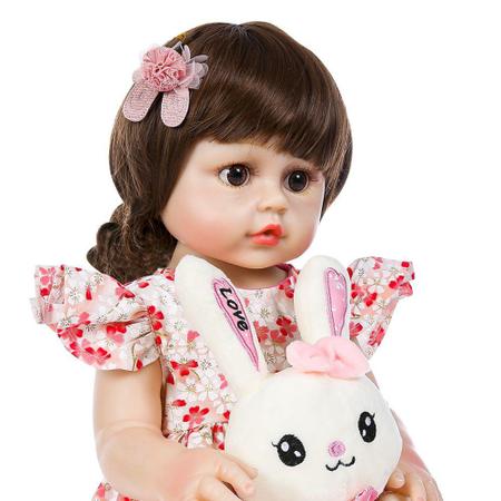 Boneca Bebê Reborn Vinil Realista com Girafinha e acessórios 45cm