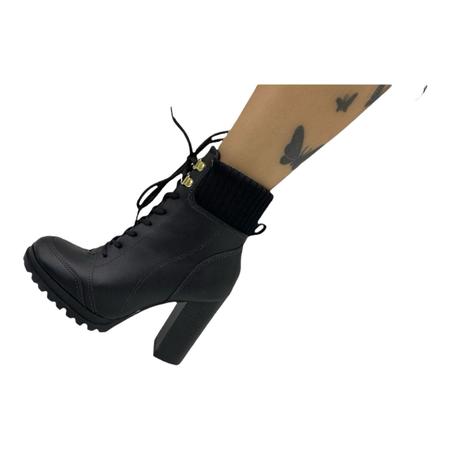 Bota feminina coturno salto alto best sale tratorado vizzano