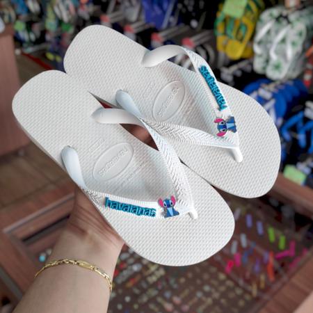 Imagem de Chinelo Havaianas Top Com Stitch Azul e Logo na Tira Feminino