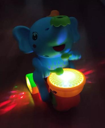 Imagem de Elefante Bate e Volta Com Luz Som Equilibra Bola Brinquedo Infantil