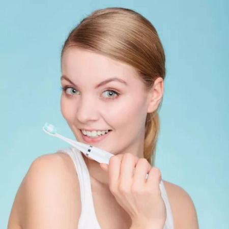 Imagem de Escova Dental Oral Elétrica Recarregável + 1 Escova Extra