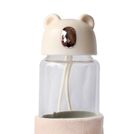 Imagem de Garrafa de vidro bear bottle com capa de veludo com tampa e alça 350ml