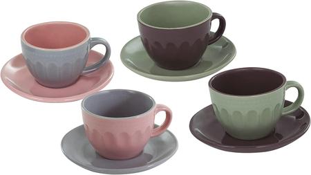 Um jogo de chá de cerâmica completo com xícaras delicadas