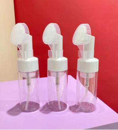 Imagem de Kit 2 Frasco pump para limpeza facial com escova de silicone ideal para o seu dia a dia