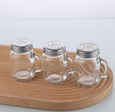 Imagem de Kit 2 Saleiro/Pimenteiro de vidro com alça e tampa inox para cozinha