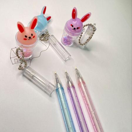Imagem de Kit 3 canetas chaveiro copinho de coelhinho com glitter material escolar