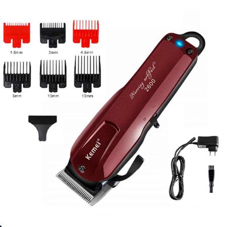 Maquininha De Cortar Cabelo Profissional Kemei 2600 Bivolt - Laurus Imagem de Maquininha De Cortar Cabelo Profissional Kemei 2600 Bivolt
