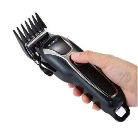 Maquininha De Tosa Pet Bivolt Profissional Kemei Km-1991 Imagem de Maquininha De Tosa Pet Bivolt Profissional Kemei Km-1991