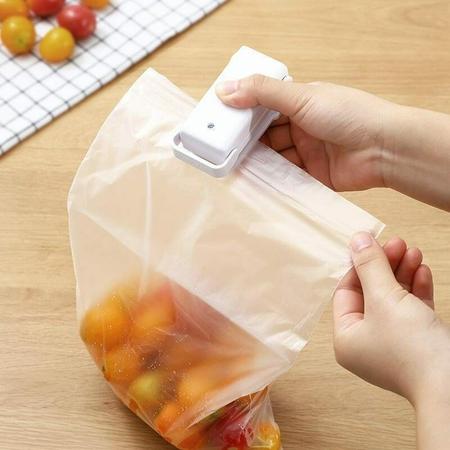 Imagem de Mini Seladora Manual Plástico Portátil Lacra Embalagem Corta