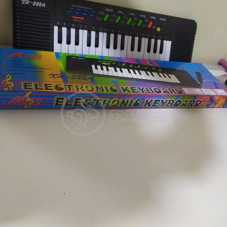 Mini Teclado Infantil Piano 32 Teclas Musical Karaokê e Microfone Crianças  Aprender a Tocar a Pilha no Shoptime