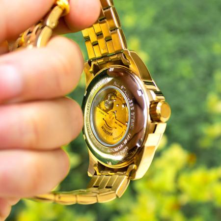 Relógio Magnum Masculino Dourado Automático MA35093A Prova d'água 2 ano de  garantia com carteira em Promoção na Americanas