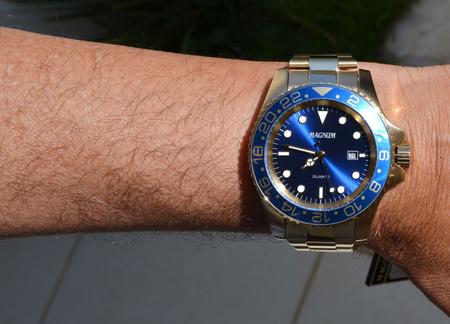 Relógio Magnum Masculino Dourado Aço Inox Calendário MA32934G - Imperial  Relógios