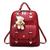 Bolsa Mochila Feminina Couro Com Chaveiro Urso Casual Vermelho