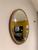 Espelho Lapidado redondo, com Moldura de 2,5cm, Aro de acabamento em Couro. COR MOLDURA AMADEIRADO/CINTA CARAMELO