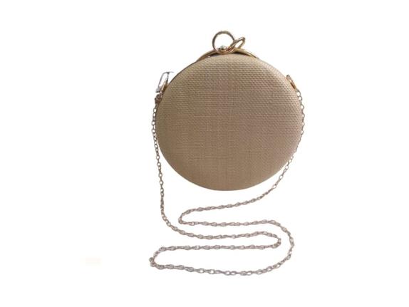clutch dourada redonda