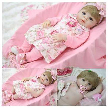 Boneca Bebe Reborn Loira Silicone 55cm Enxoval Completo Rosa Com Flores Mundo Kids Boneca Reborn Magazine Luiza