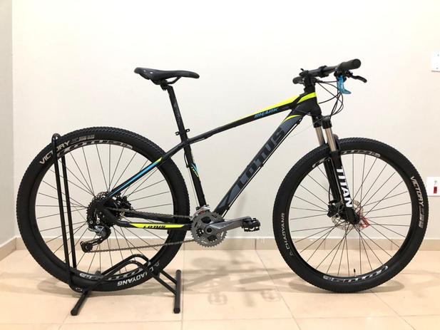 Bicicleta Lotus Hawk Aro 29 Quadro 19 Freio Hidráulico Laranja Neon em  oferta na Estrela10