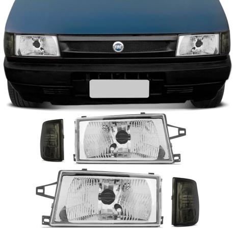 Kit Farol Uno Fiorino Elba Prêmio 91 a 96 Máscara Cromada Foco Simples + Pisca Fumê - Rcd Menor preço em Kit Farol Uno Fiorino Elba Prêmio 91 a 96 Máscara Cromada Foco Simples + Pisca Fumê - Rcd