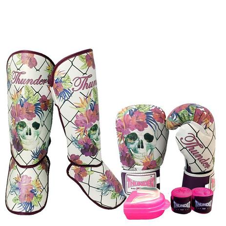 Kit feminino caveira grades Muay Thai Kickboxing - Luva 10 oz  + caneleira 20mm + bandagem 3 metros + protetor bucal - Thunder Fight - ref 951 é boa?