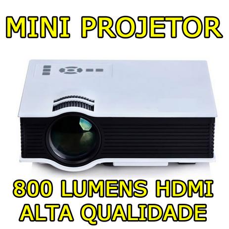 Mini Projetor Led HD mpr 7007 Hdmi Led 800 Lumens Usb Avi Xbox Ps4 - Tomate Menor preço em Mini Projetor Led HD mpr 7007 Hdmi Led 800 Lumens Usb Avi Xbox Ps4 - Tomate