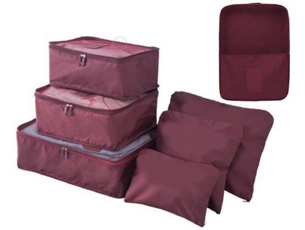 suitcase with bolsa on top